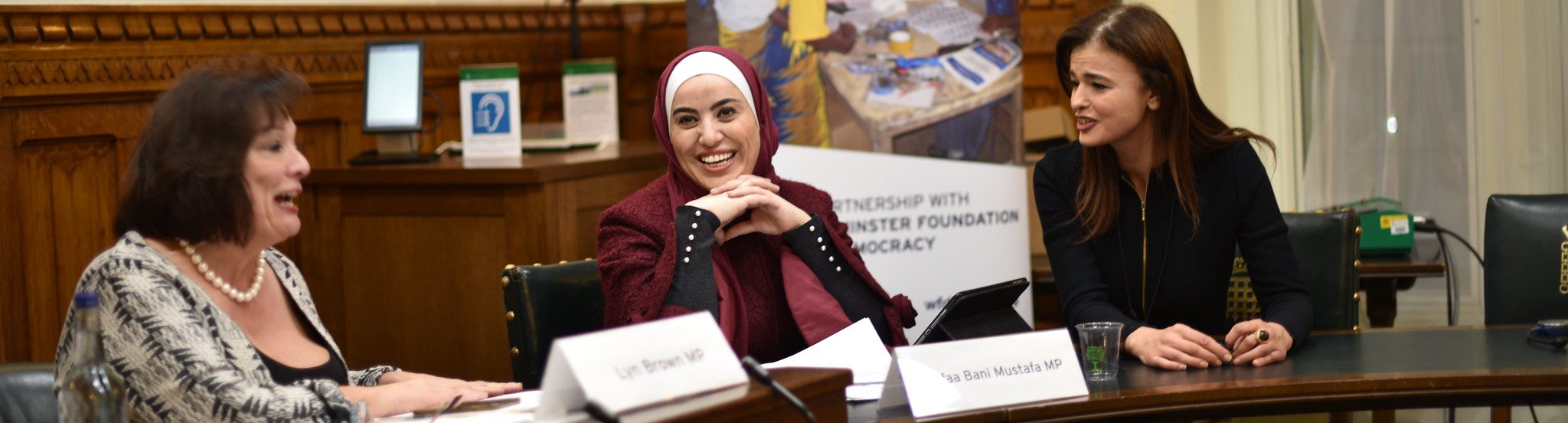 A member of the coalition of women MPs from Arab countries with WFD staff member and UK MP