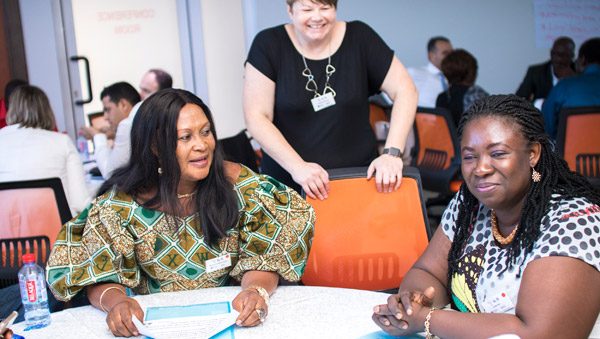 Women sitting at a table talking