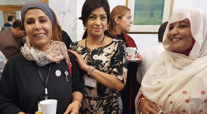 Women having a coffee break at a meeting
