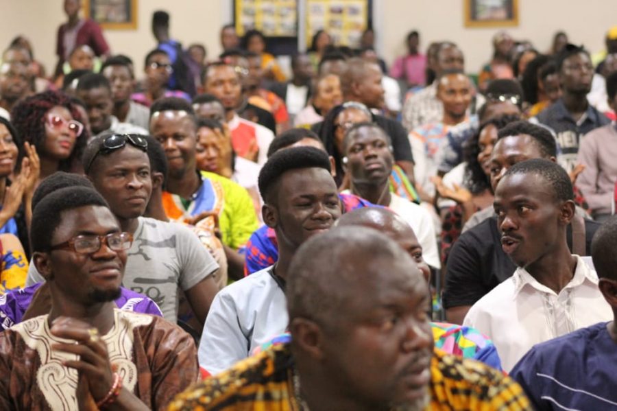 Many people in a townhall meeting