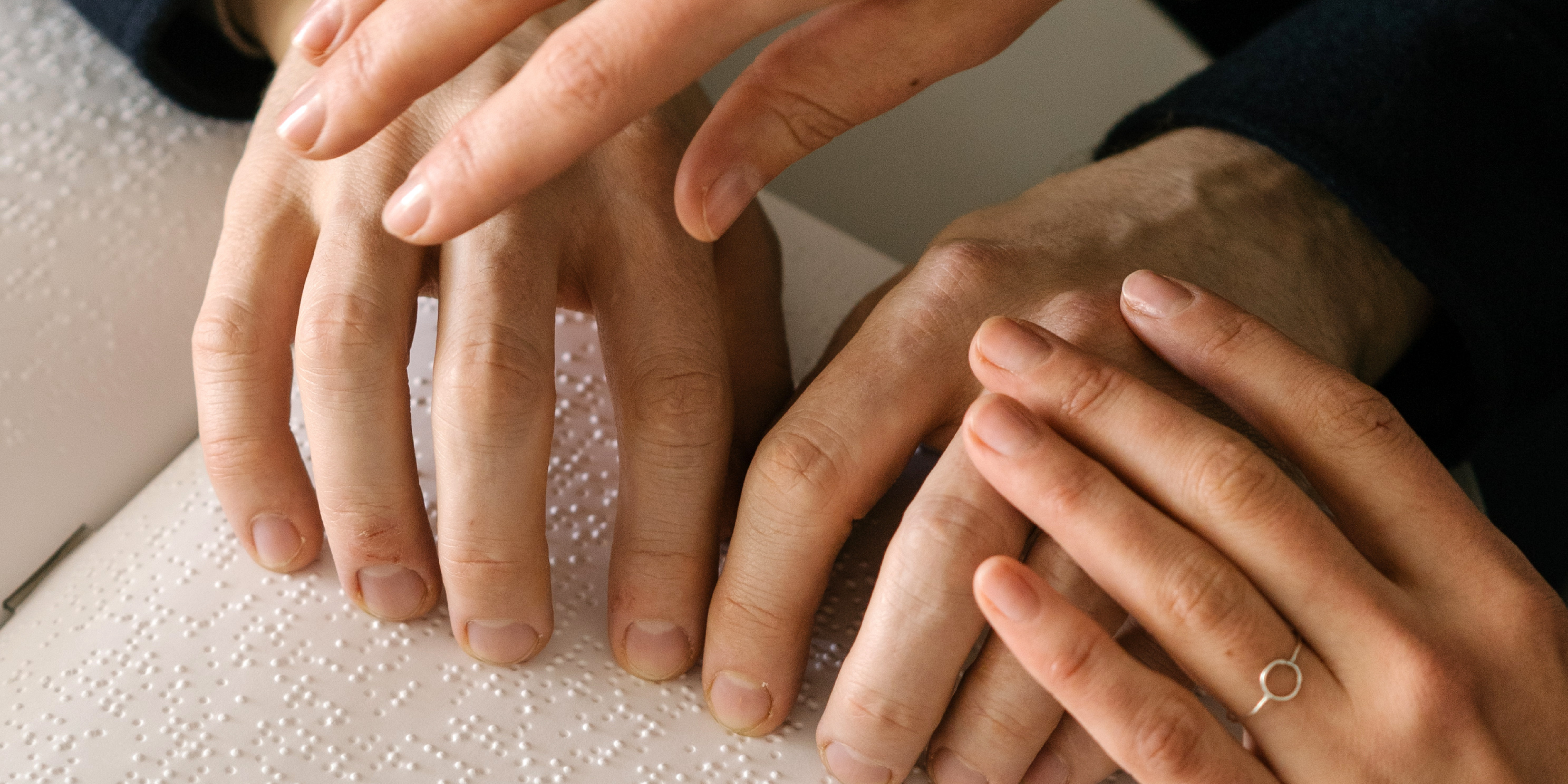 Hands on a book for the blind