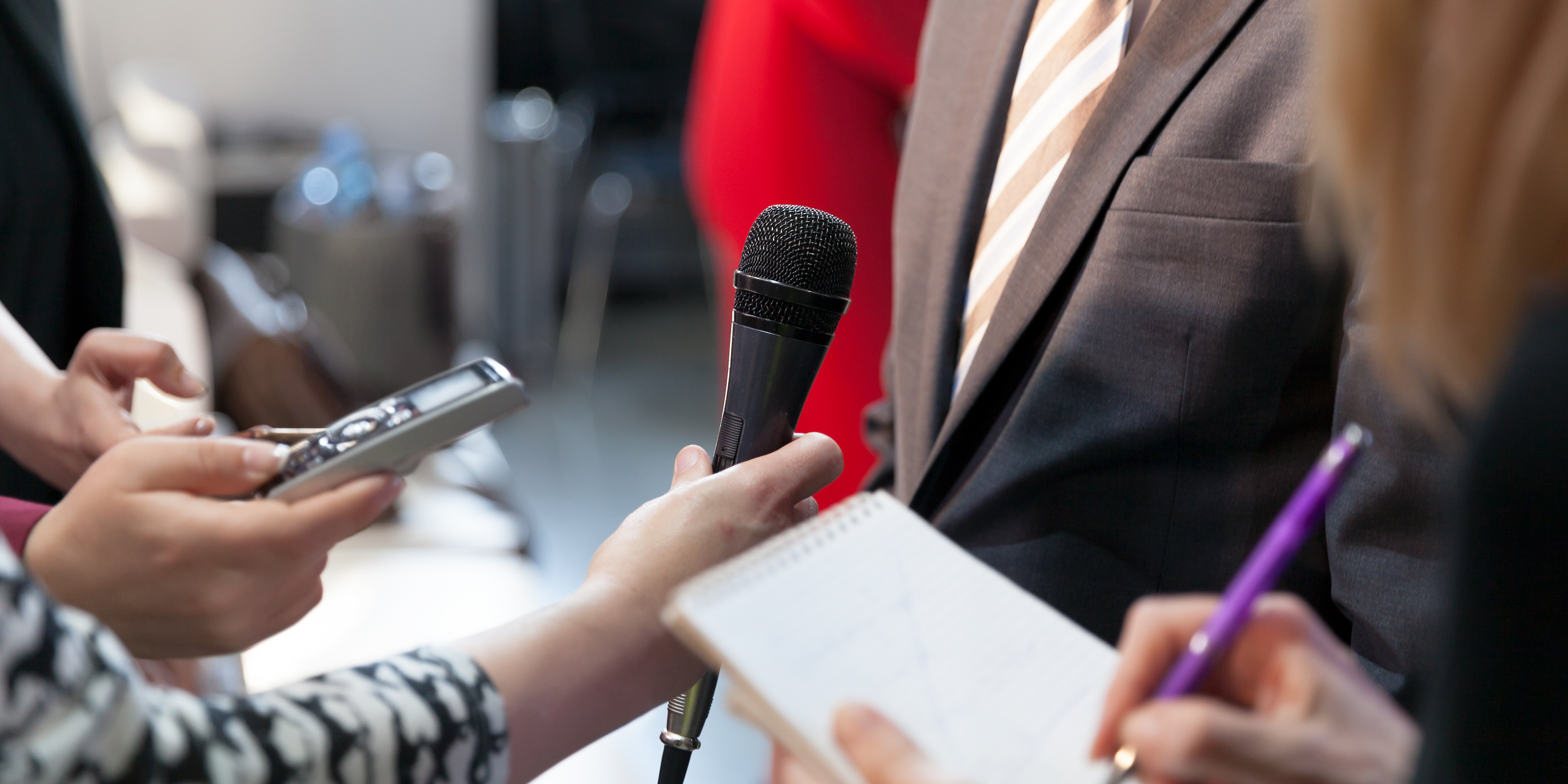 reporters taking a statement