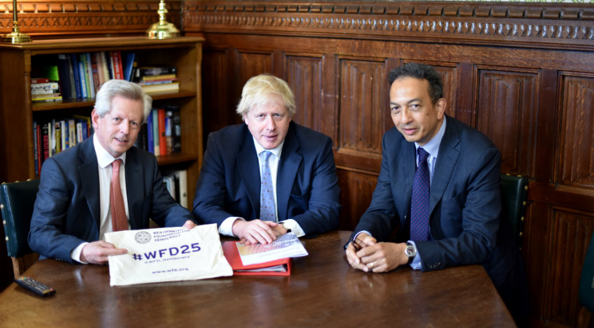 Three people sitting 