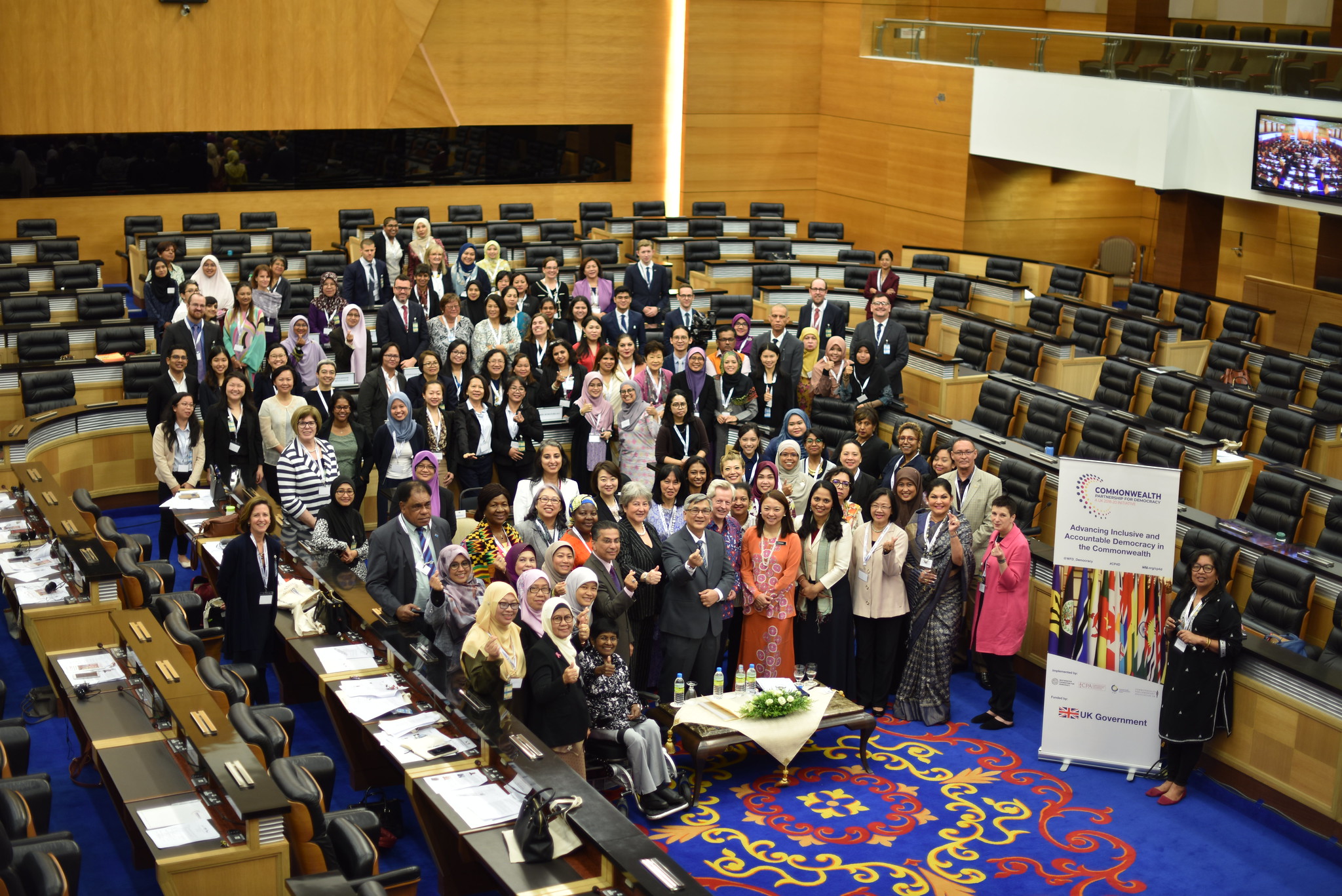 A large group of people in a conference hall