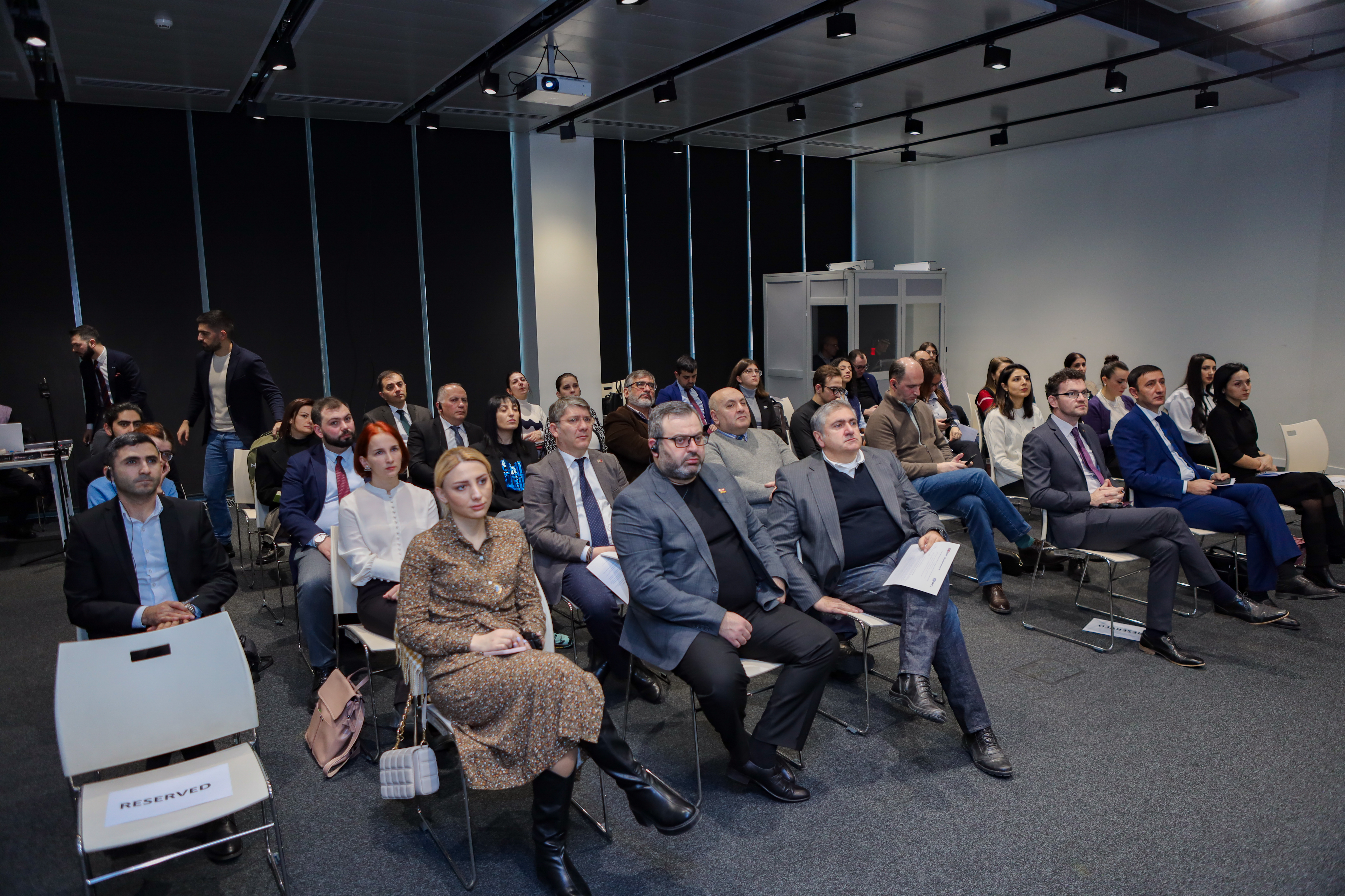 Group of people participating in the launch event 