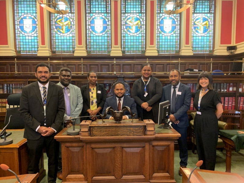 A group photo of the delegation participating in the event 