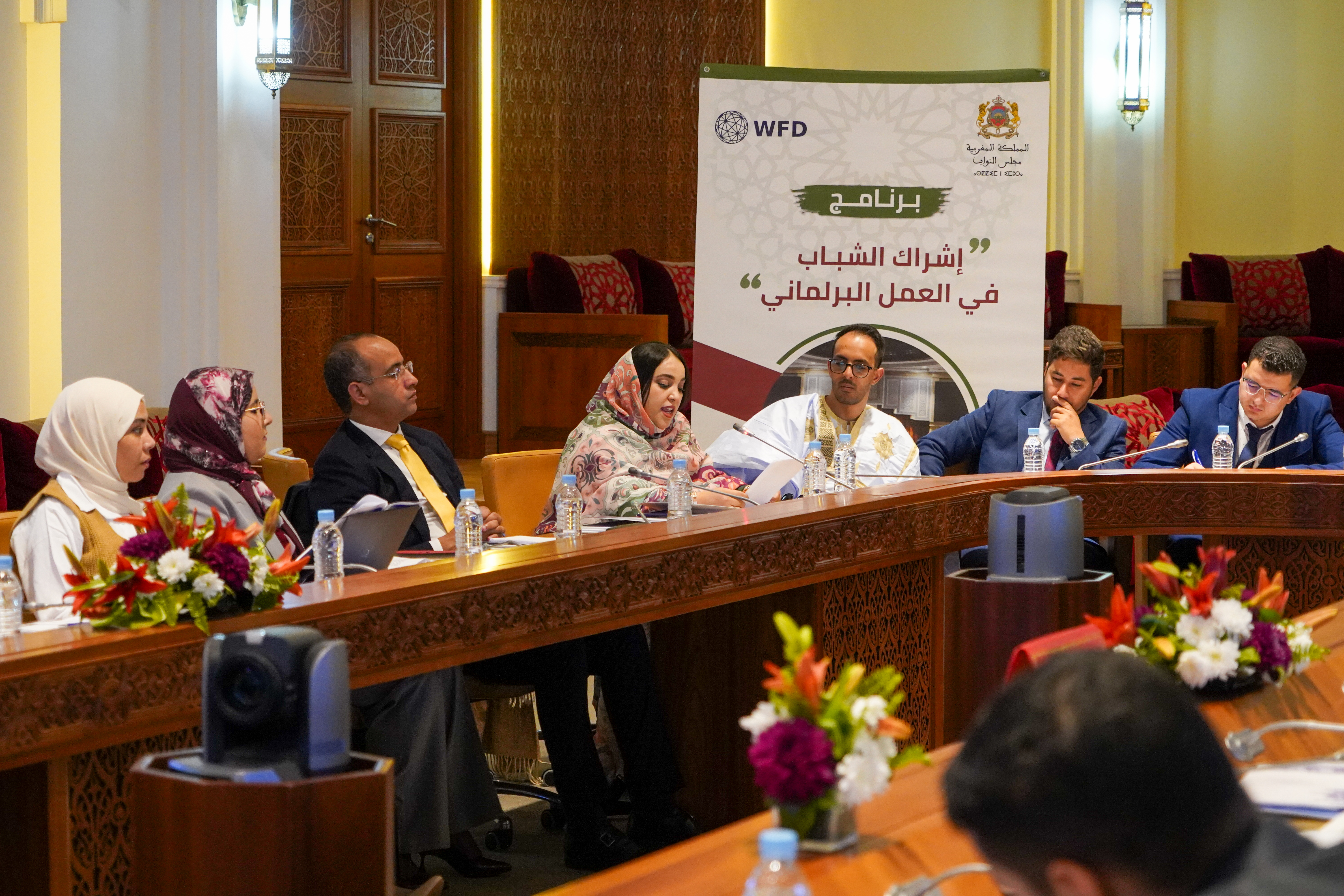 Young people presenting policy recommendations at Moroccan Parliament