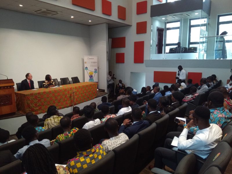 Students in a mock parliament meeting