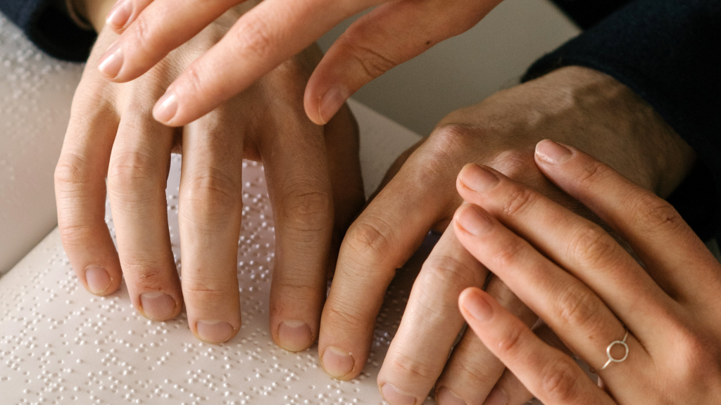 Hands on a book for the blind