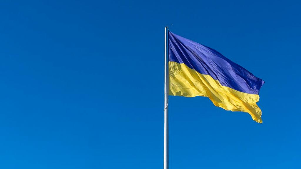 Flag of Ukraine flying against a clear blue sky12