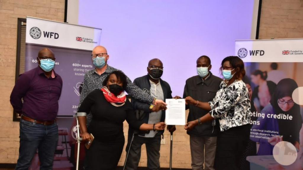 People holding a certificate