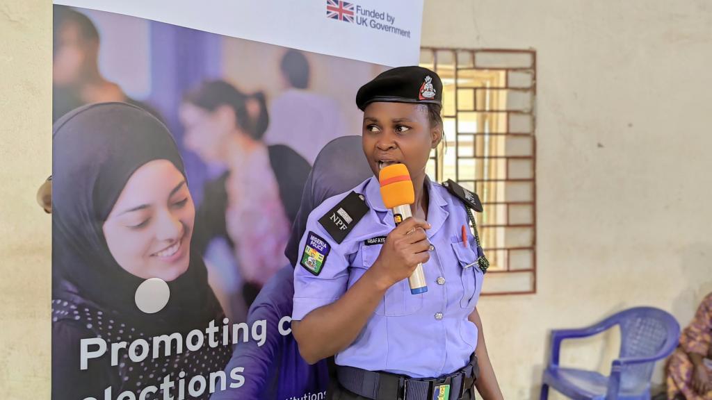 A police officer sharing knowledge gained from the sensitisation