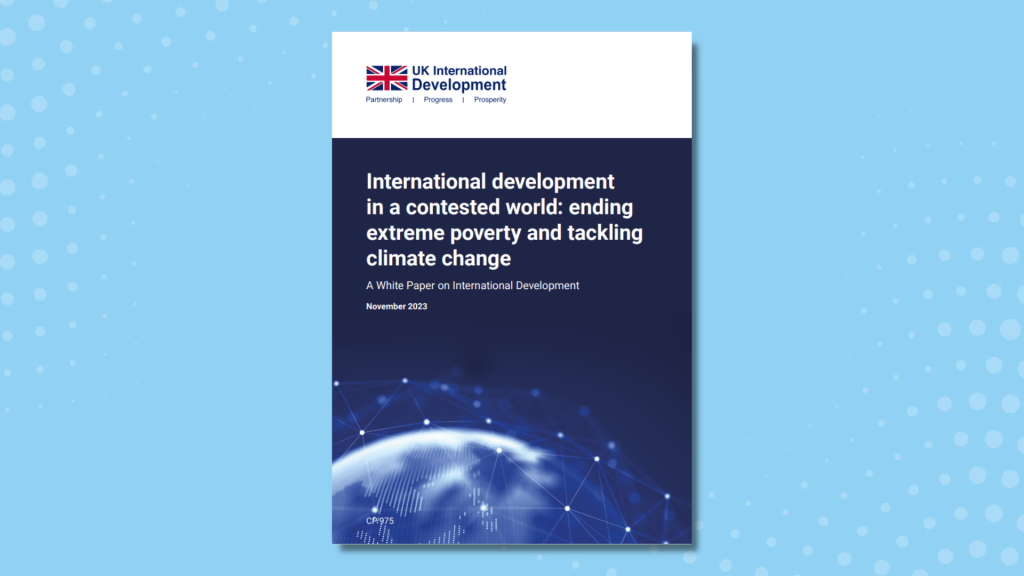 The front cover of the white paper displaying the title International development  in a contested world: ending  extreme poverty and tackling climate change