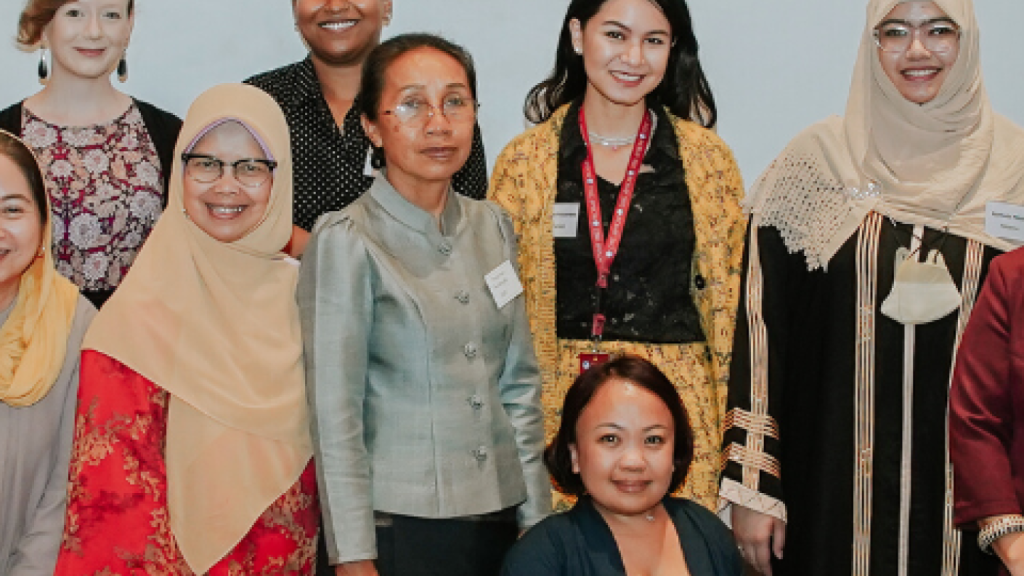 A group photo of the delegation participating in the event 