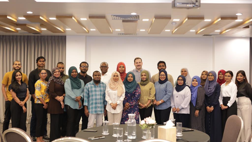A group photo of CSO members participating in an event in Maldives 