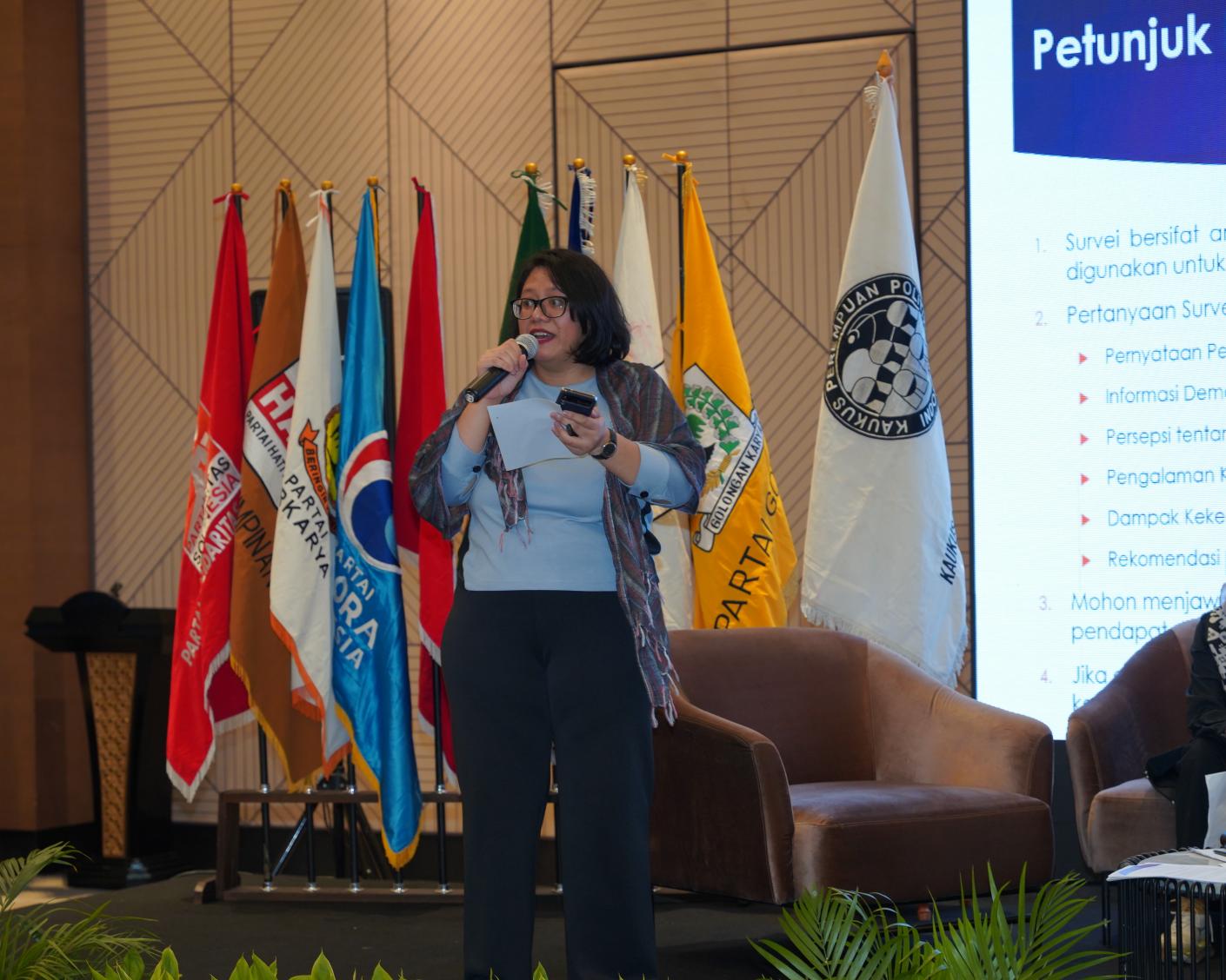 A speaker addressing the audience in a seminar