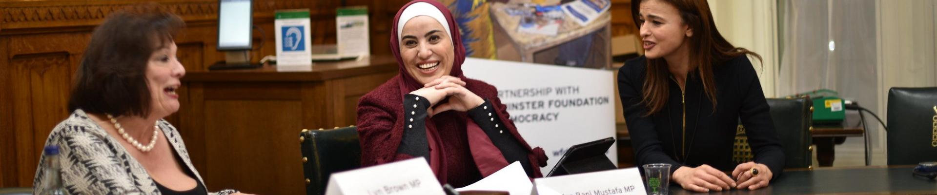 A member of the coalition of women MPs from Arab countries with WFD staff member and UK MP