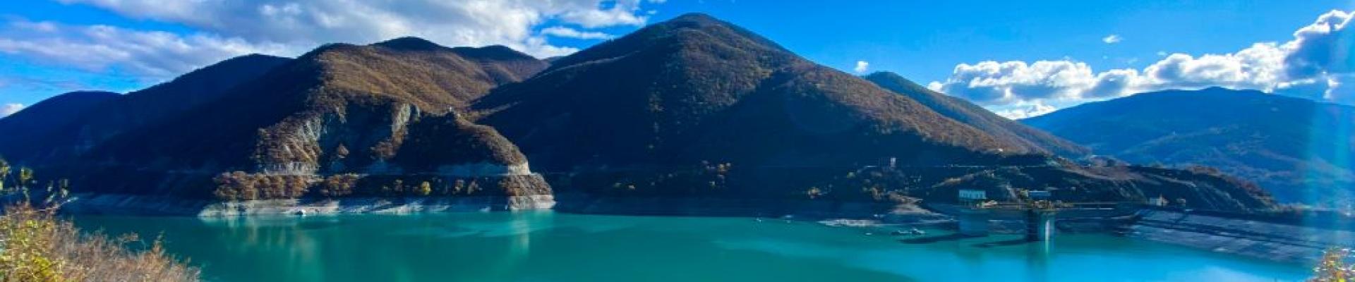 Mountain with a lake beside it