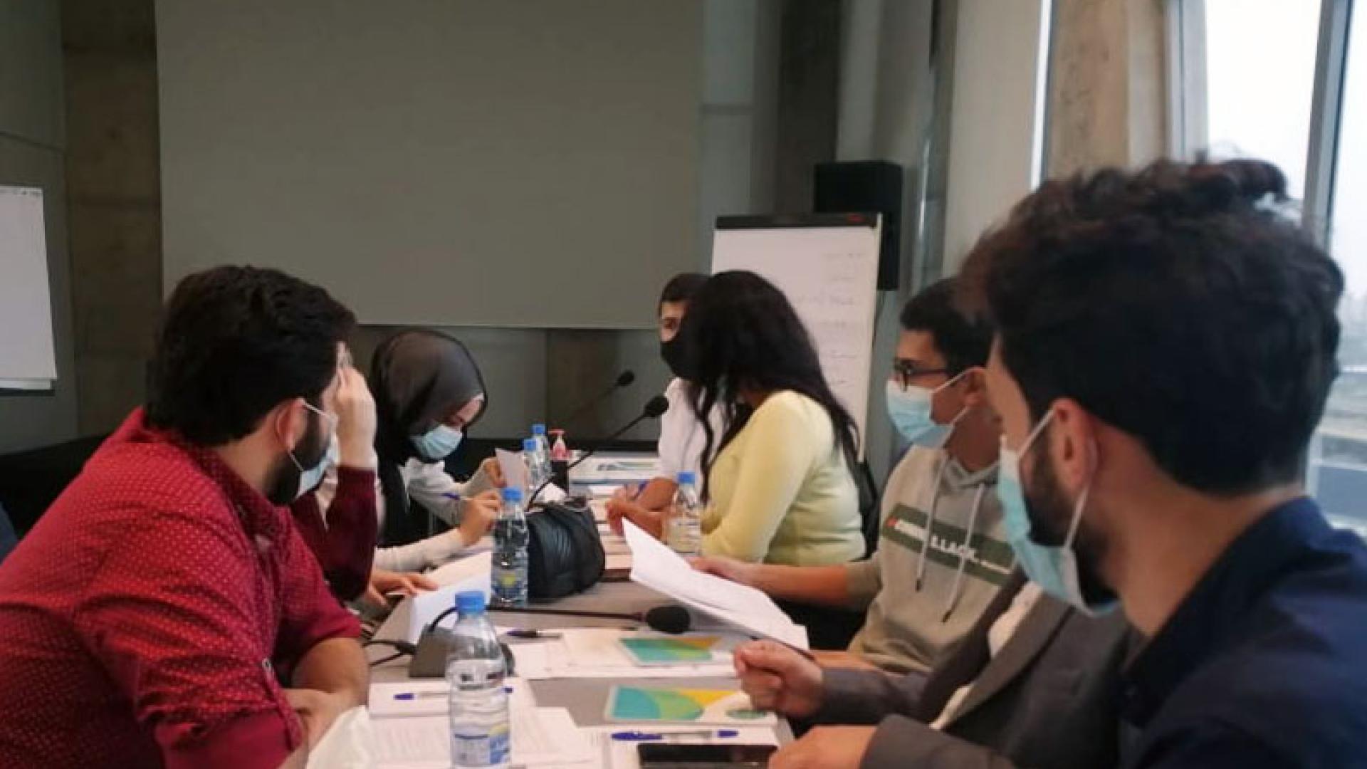 Young people working together at a table