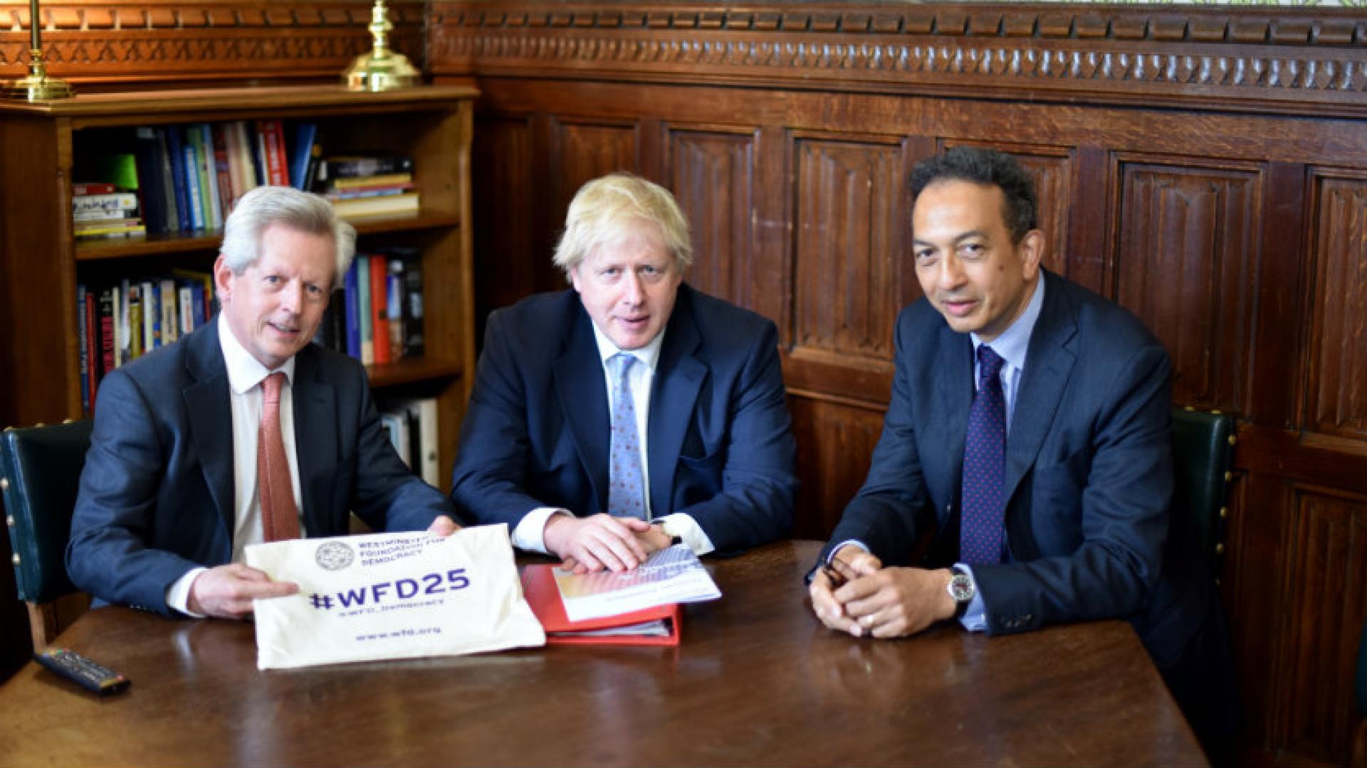 Three people sitting