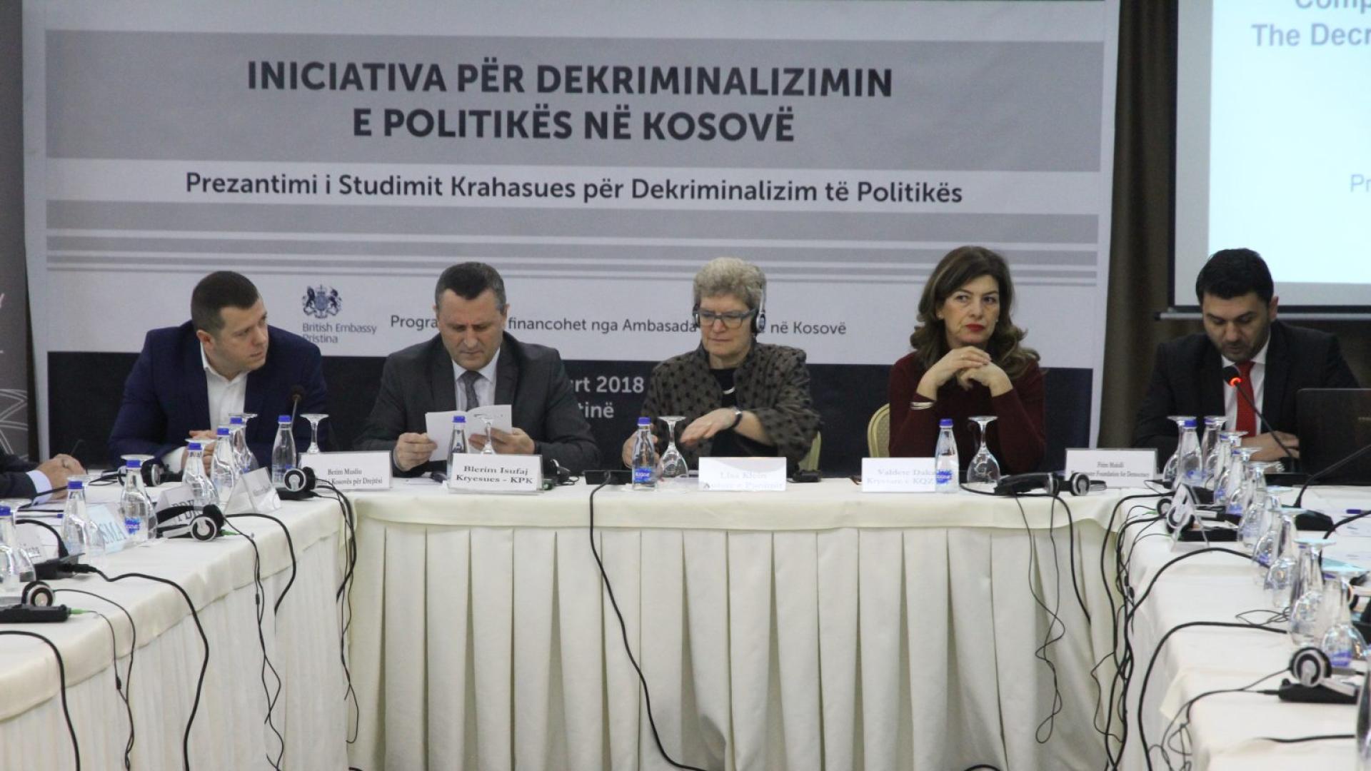 People sitting doing a press conference