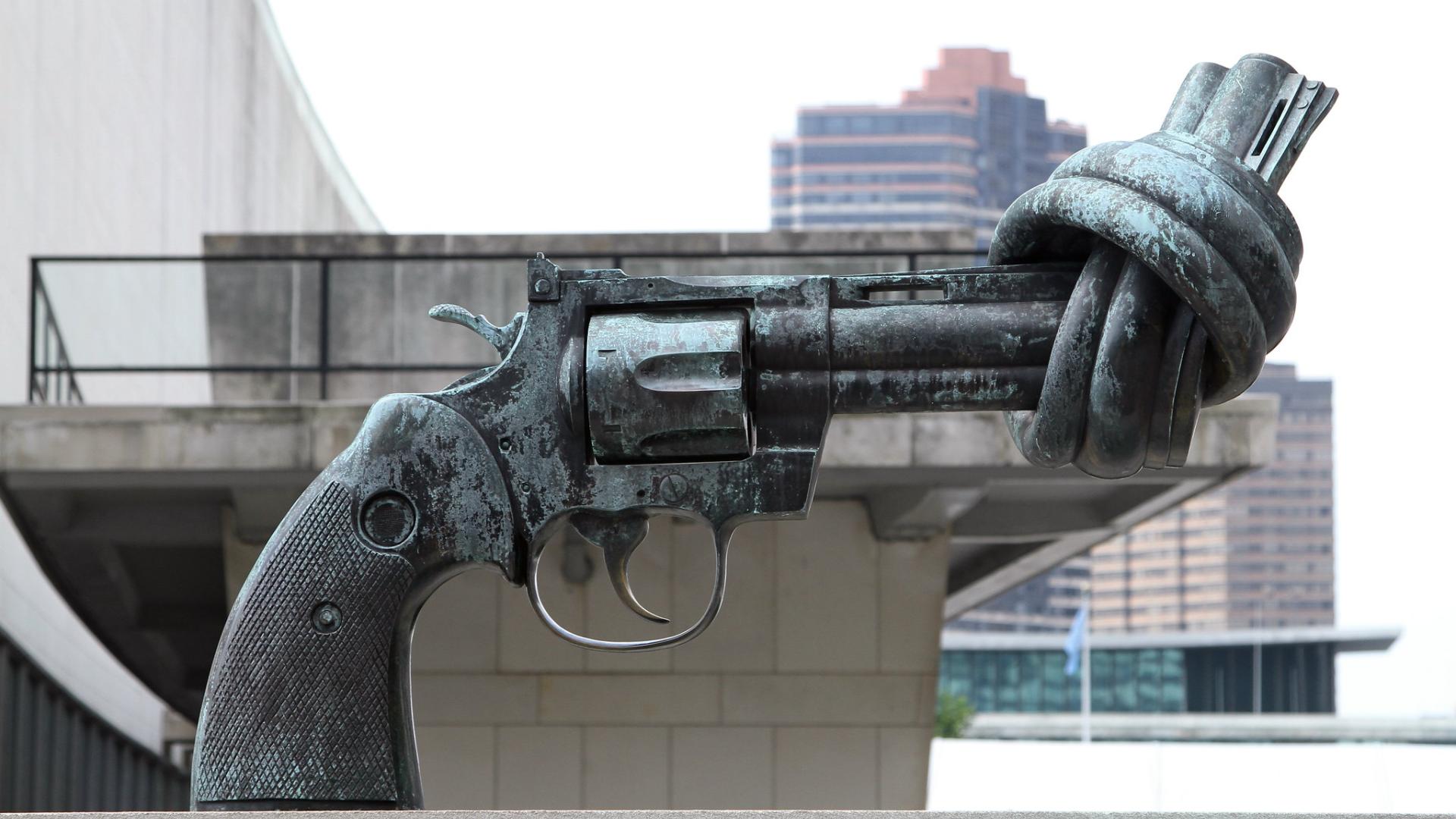 A large statue of a knotted gun at the UN in New York