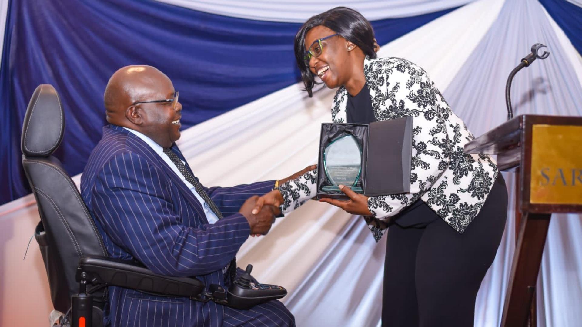  HON. (DR.) JACKSON KIPKEMOI KOSGEI of the Kenya Disability Parliamentary Association (KEDIPA), receiving an award for outstanding promotion of disability inclusion within the legislative and policy agenda during the Kenya Inclusive Political Parties award ceremony on December 6th