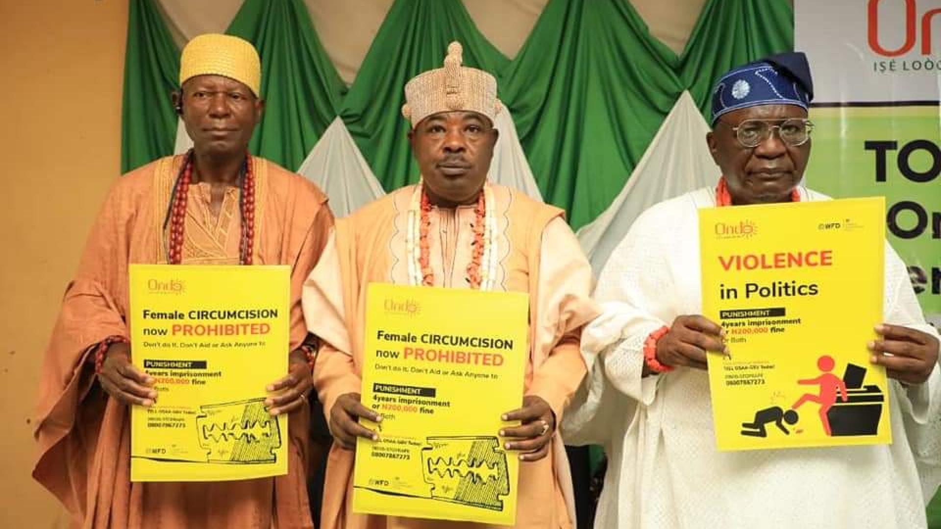 People holding a placard