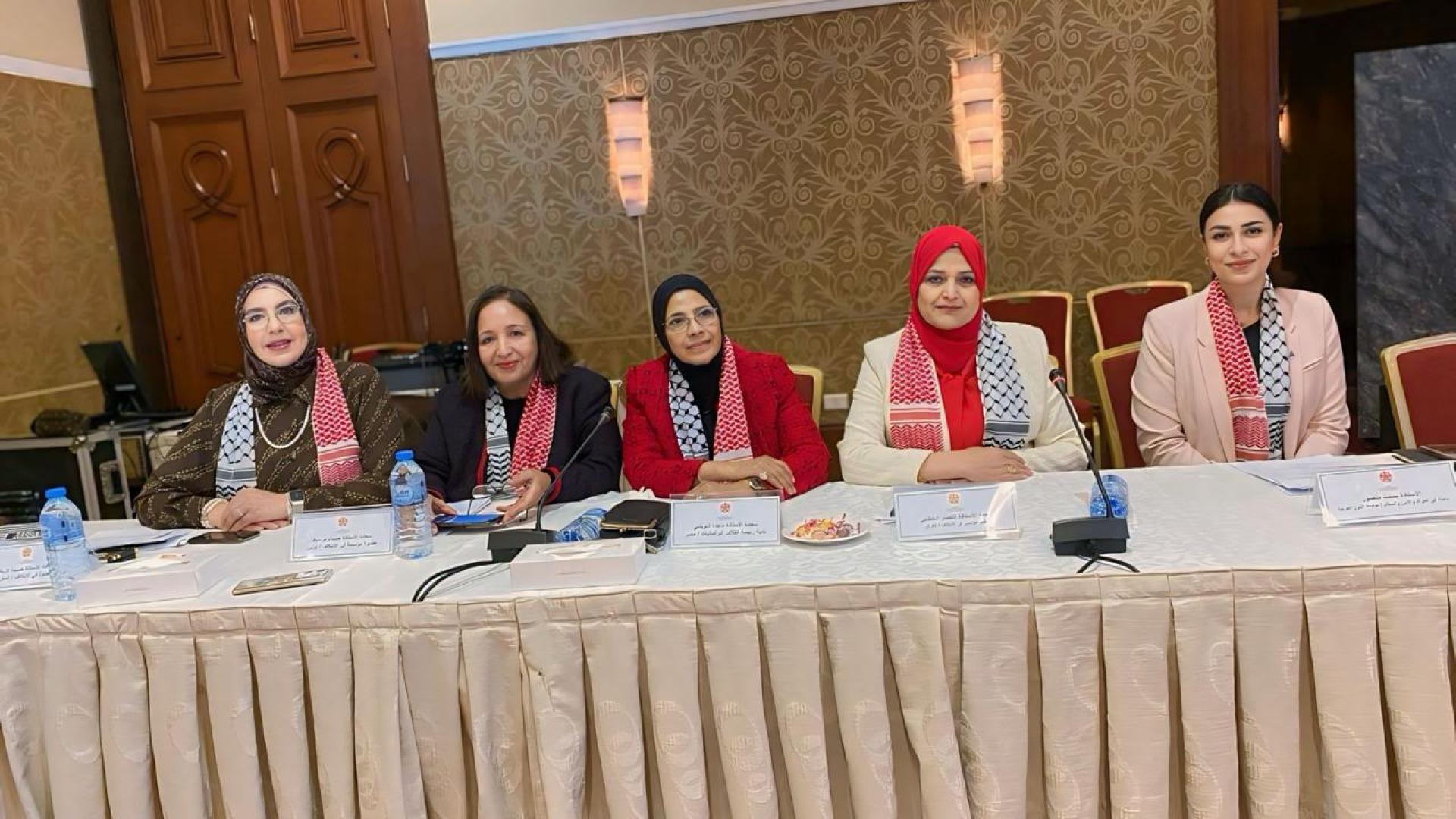 Panel of women smiling at the camera