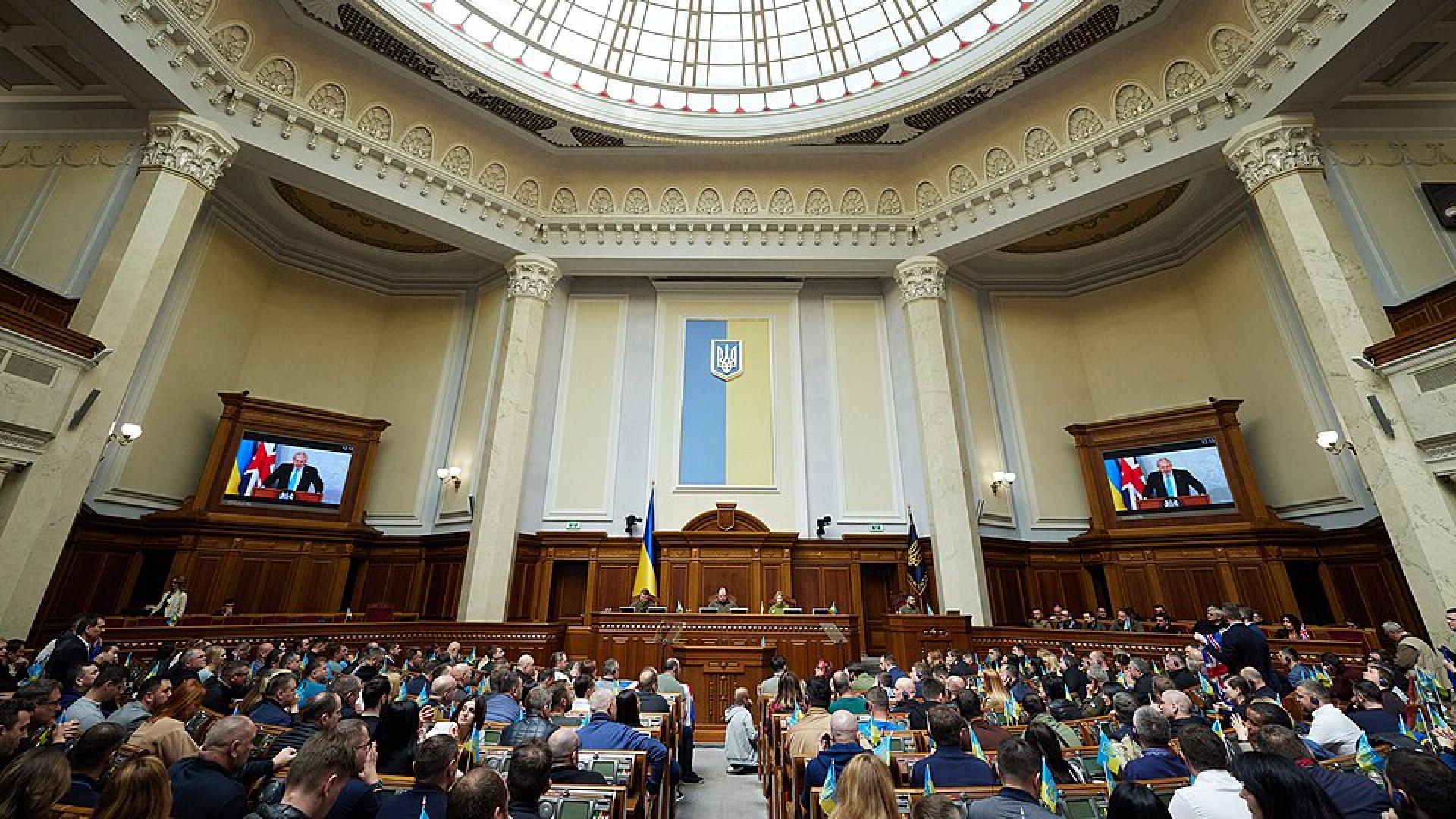 Inside the chamber of the Verkhovna Rada of Ukraine, Ukraine's parliament. MPs sit in front of the President