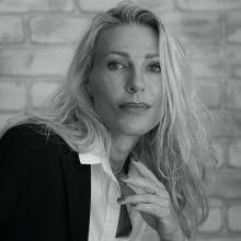 A woman looking at the camera