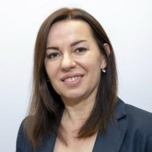 a woman smiling at the camera
