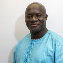 A man posing for a portrait photo